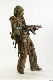 Photos John Hopkins Army Postapocalyptic Suit Poses aiming the gun…